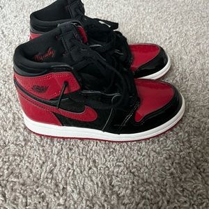 Red and black patent leather dunks